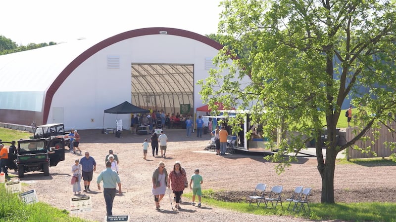 People walk to the Marathon County Dairy Breakfast