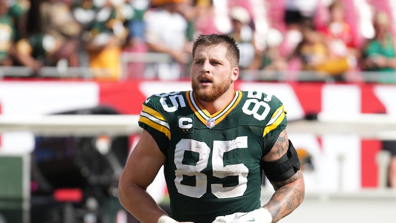 Green Bay Packers tight end Tucker Kraft (85) leaves the field following an NFL football game...
