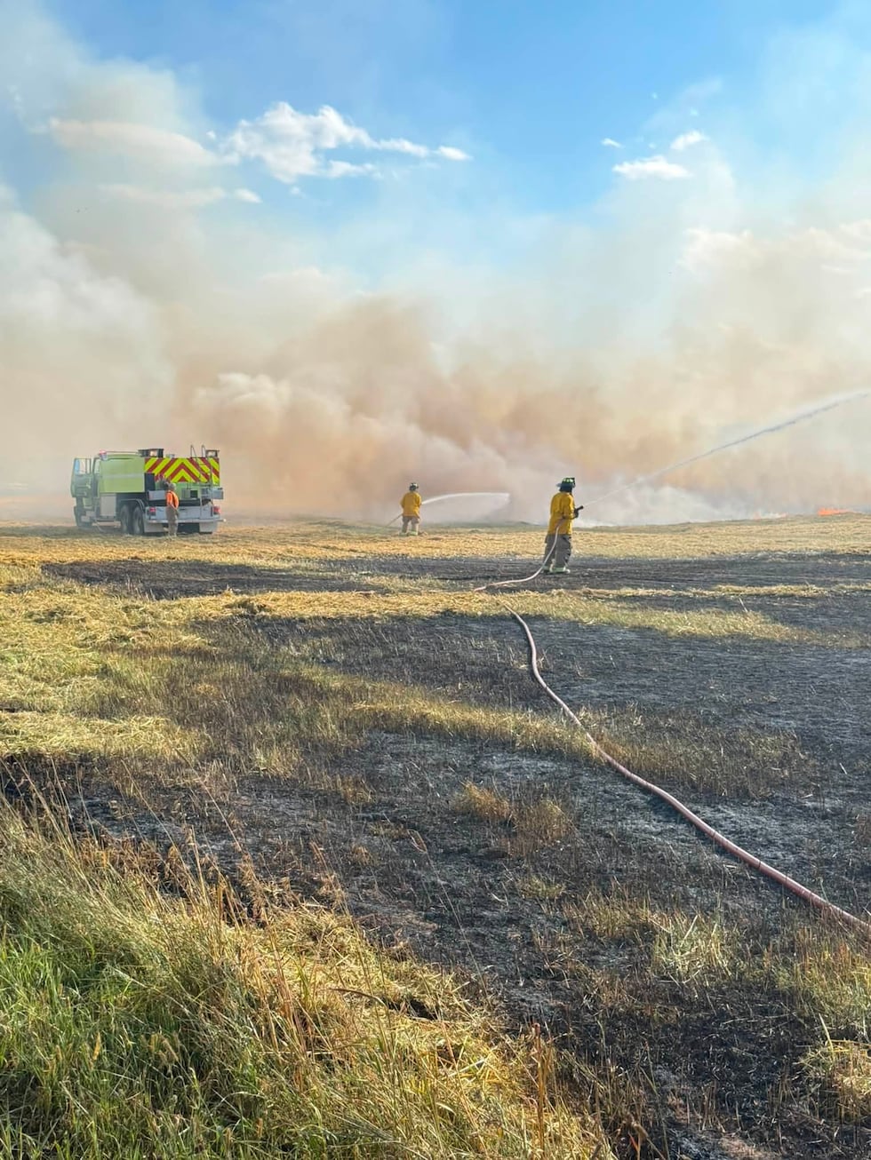 Crews battle fire in Eagle River farm field