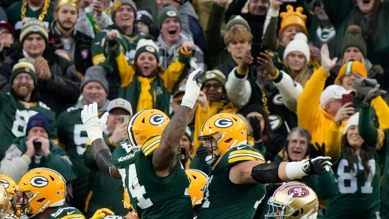 Green Bay Packers guard Elgton Jenkins, left, and Green Bay Packers center Josh Myers, right,...