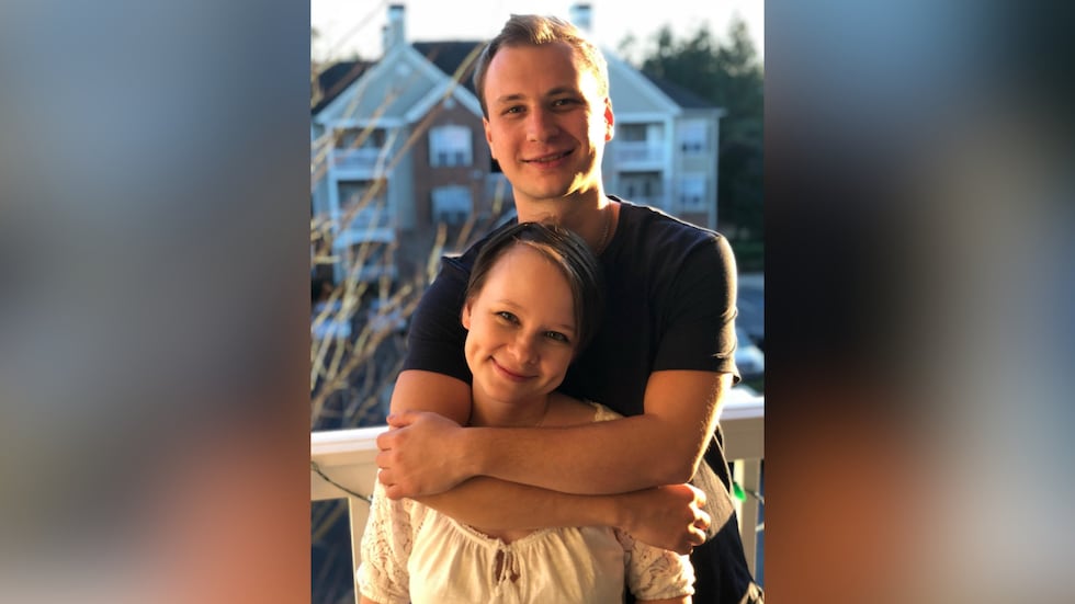 This photo provided by the family shows Robert Gilman and his sister, Lexie Hudson, in...