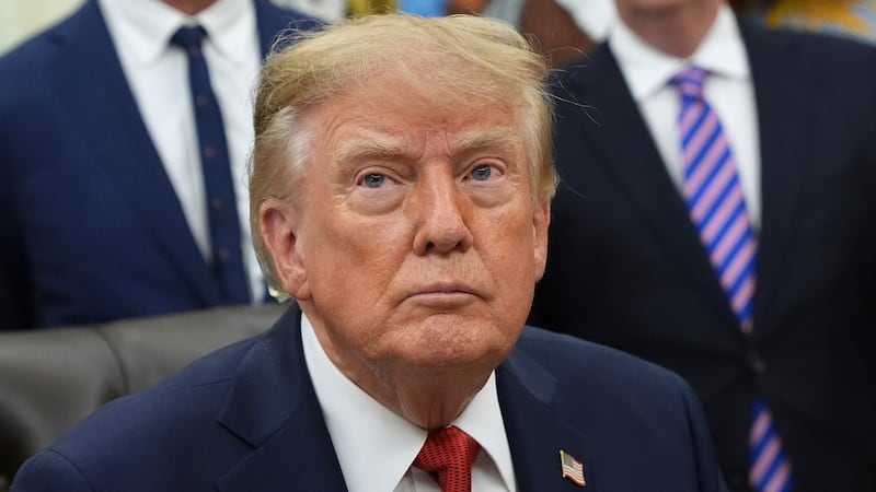 President Donald Trump listens during an event about healthcare in the Oval Office of the...
